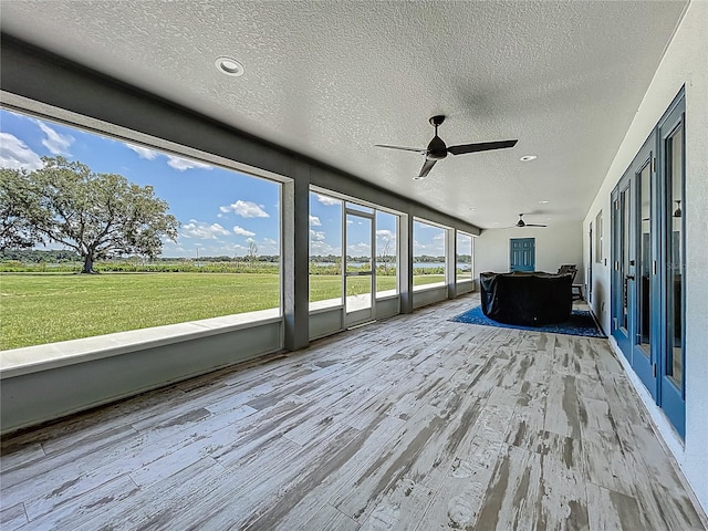 14243 County Road 450, Umatilla, FL 32784 - unfurnished sunroom with ceiling fan