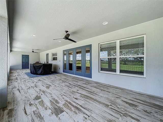 14243 County Road 450, Umatilla, FL 32784 - wooden terrace featuring ceiling fan and french doors