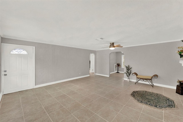 1506 S Elliott St, Sanford, FL 32771 - tiled entrance foyer featuring arched walkways, a ceiling fan, and crown molding
