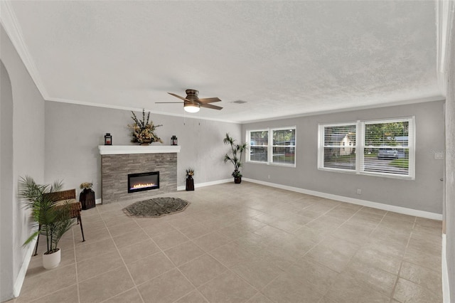 1506 S Elliott St, Sanford, FL 32771 - unfurnished living room featuring crown molding, a ceiling fan, a stone fireplace, and a textured ceiling
