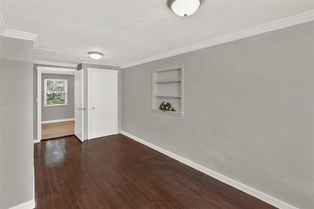 1506 S Elliott St, Sanford, FL 32771 - empty room featuring built in features, wood-type flooring, and ornamental molding