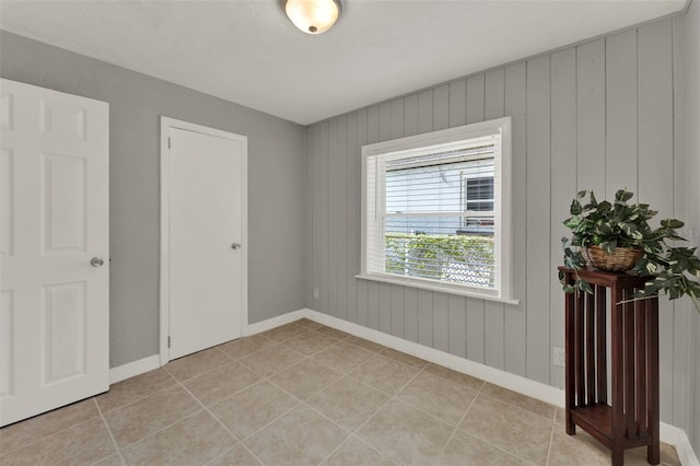 1506 S Elliott St, Sanford, FL 32771 - spare room with baseboards and light tile patterned floors