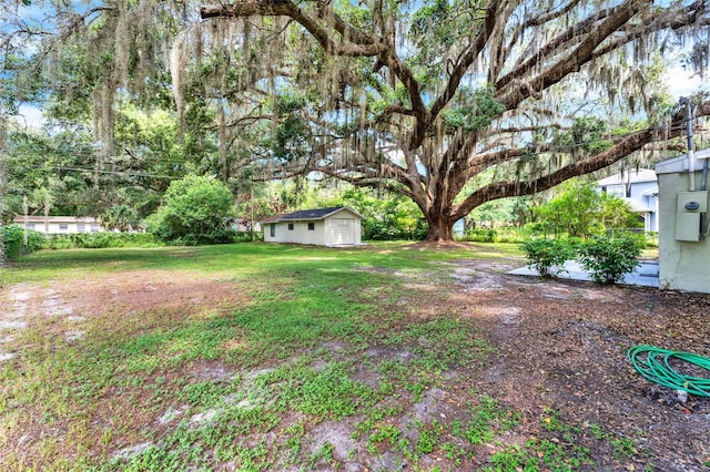 1506 S Elliott St, Sanford, FL 32771 - view of grassy yard with an outdoor structure