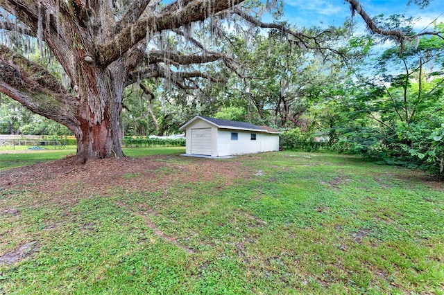 1506 S Elliott St, Sanford, FL 32771 - view of grassy yard featuring an outdoor structure
