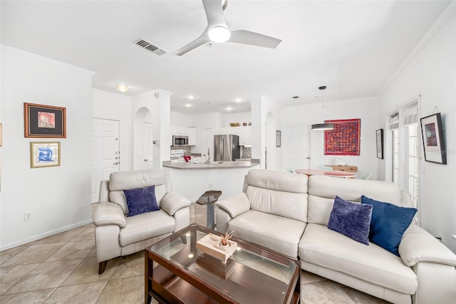 860 N Orange Ave Unit 210, Orlando, FL 32801 - living area with arched walkways, crown molding, light tile patterned floors, a ceiling fan, and recessed lighting