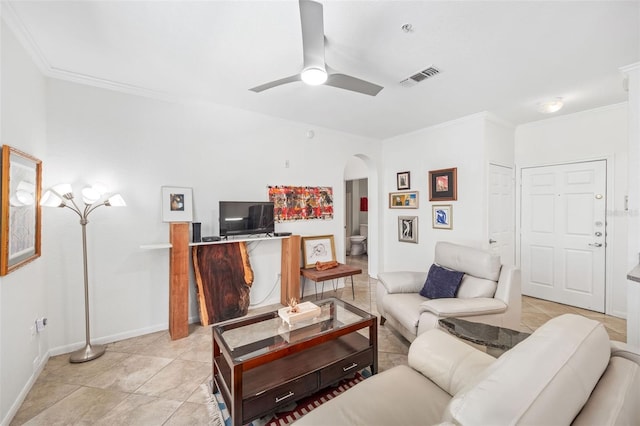 860 N Orange Ave Unit 210, Orlando, FL 32801 - living area featuring arched walkways, crown molding, ceiling fan, and light tile patterned flooring