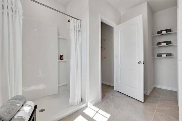 5157 Masser Rd, Saint Cloud, FL 34772 - full bathroom featuring a stall shower and tile patterned floors
