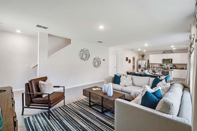 5157 Masser Rd, Saint Cloud, FL 34772 - living room with recessed lighting and baseboards