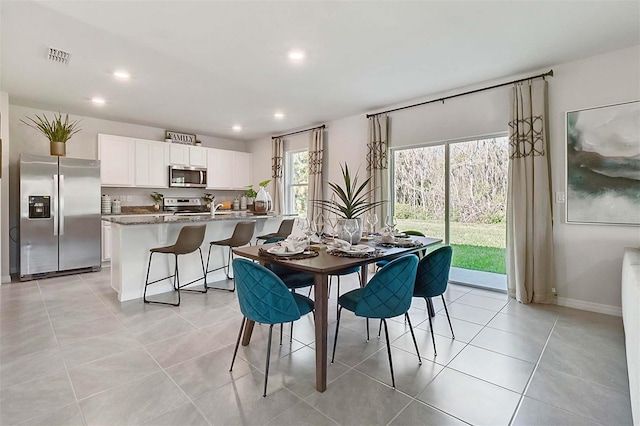 5157 Masser Rd, Saint Cloud, FL 34772 - dining area featuring recessed lighting and light tile patterned floors