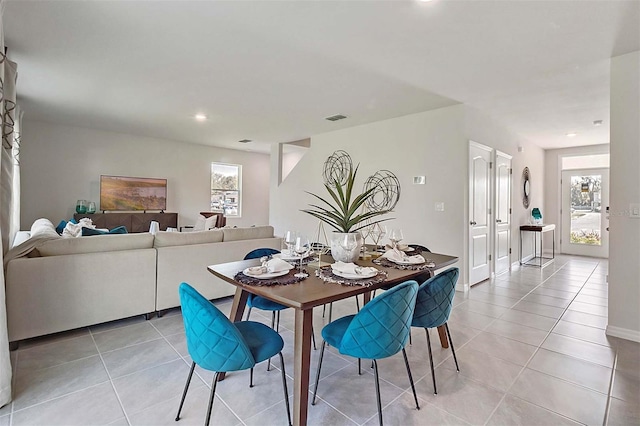 5157 Masser Rd, Saint Cloud, FL 34772 - dining room with light tile patterned floors, plenty of natural light, and recessed lighting