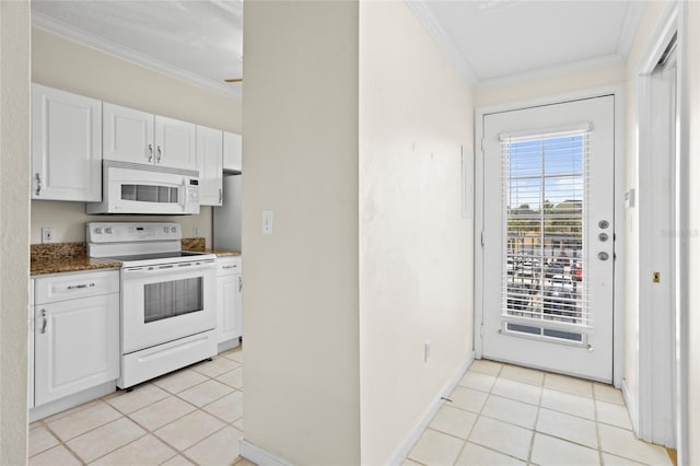 660 Celebration Ave Unit 250, Kissimmee, FL 34747 - kitchen featuring white appliances, light tile patterned floors, ornamental molding, and white cabinetry