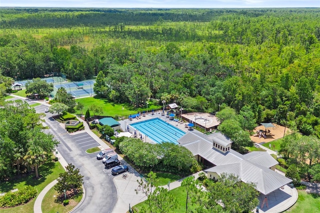 660 Celebration Ave Unit 250, Kissimmee, FL 34747 - drone / aerial view of a heavily wooded area and a pool area