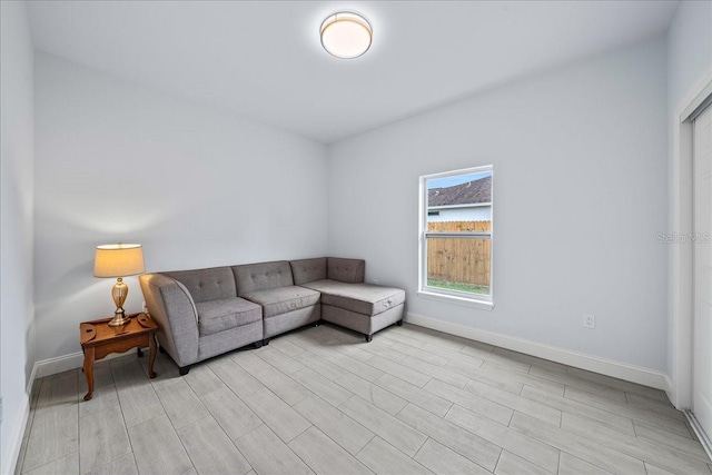 7160 Carlowe Ave, Cocoa, FL 32927 - living room with baseboards and light wood-style floors
