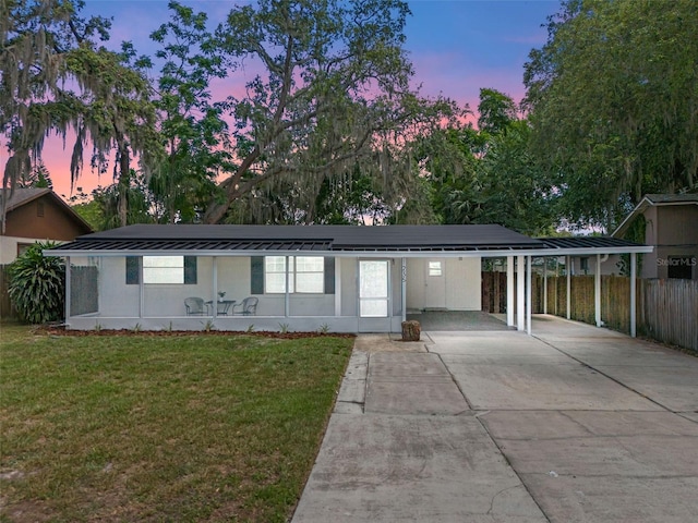 235 Ruth Blvd, Longwood, FL 32750 - ranch-style house featuring concrete driveway and a carport
