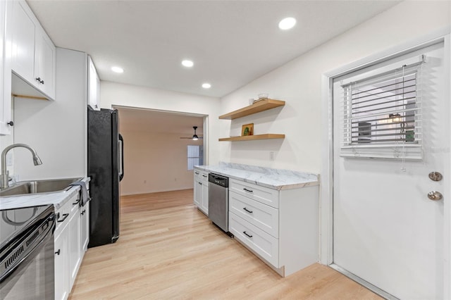 235 Ruth Blvd, Longwood, FL 32750 - kitchen with black appliances, white cabinetry, light wood-type flooring, a ceiling fan, and open shelves