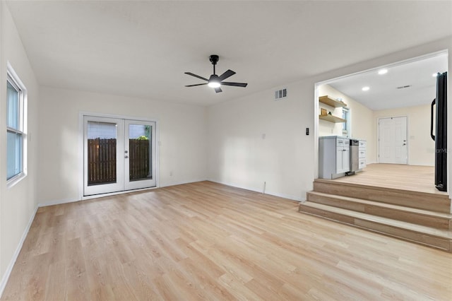 235 Ruth Blvd, Longwood, FL 32750 - unfurnished living room featuring light wood-style flooring, french doors, ceiling fan, and recessed lighting