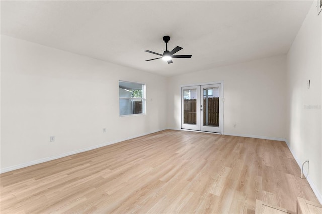 235 Ruth Blvd, Longwood, FL 32750 - spare room with french doors, light wood-style flooring, and a ceiling fan