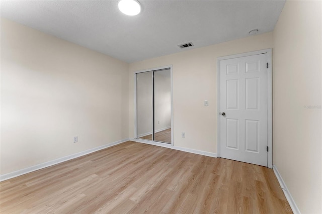 235 Ruth Blvd, Longwood, FL 32750 - unfurnished bedroom featuring light wood-type flooring and a closet