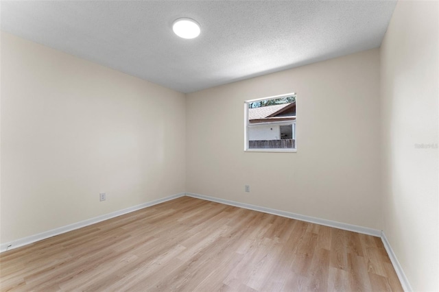 235 Ruth Blvd, Longwood, FL 32750 - empty room with light wood-type flooring and a textured ceiling