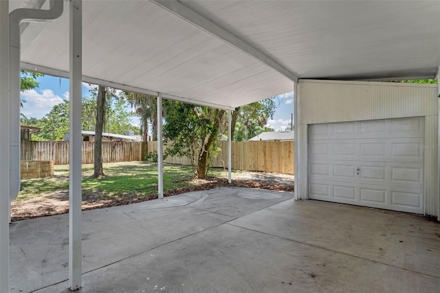 235 Ruth Blvd, Longwood, FL 32750 - fenced backyard with a carport and a garage