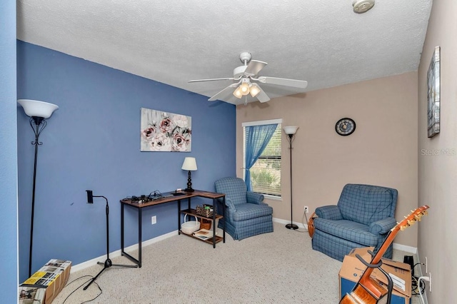 7120 N Glenridge Cir, Citrus Springs, FL 34434 - sitting room featuring a ceiling fan, carpet flooring, and a textured ceiling