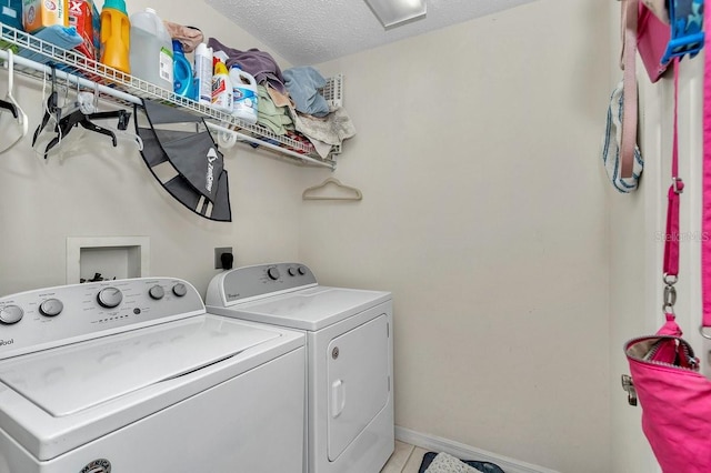 7120 N Glenridge Cir, Citrus Springs, FL 34434 - washroom featuring washing machine and dryer and a textured ceiling