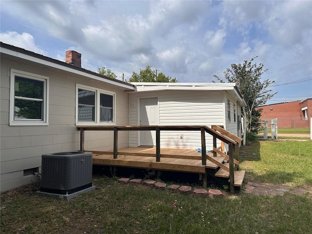 4274 2nd Ave, Marianna, FL 32446 - back of property featuring a wooden deck, a chimney, a yard, and crawl space