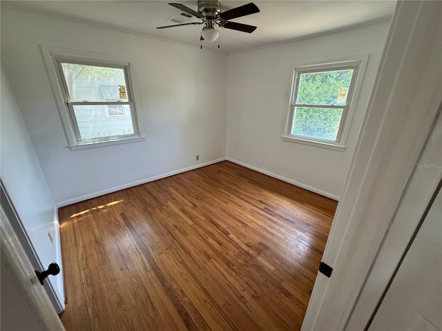 4274 2nd Ave, Marianna, FL 32446 - empty room featuring wood finished floors, ornamental molding, and a ceiling fan