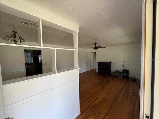 4274 2nd Ave, Marianna, FL 32446 - unfurnished living room featuring a ceiling fan and wood finished floors