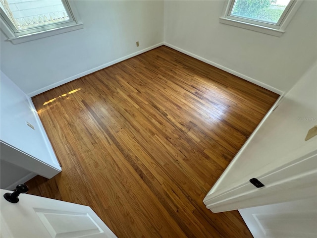4274 2nd Ave, Marianna, FL 32446 - empty room with baseboards and wood finished floors