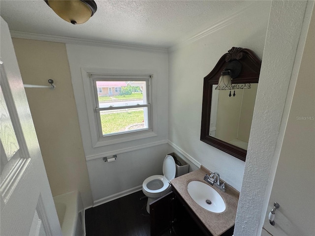 4274 2nd Ave, Marianna, FL 32446 - full bath with vanity, a textured ceiling, a tub, and crown molding