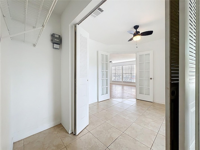 645 Stafford Ter Unit 163, Altamonte Springs, FL 32714 - corridor featuring french doors and light tile patterned floors