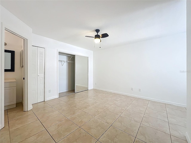 645 Stafford Ter Unit 163, Altamonte Springs, FL 32714 - unfurnished bedroom with light tile patterned floors and a ceiling fan