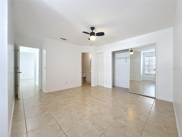 645 Stafford Ter Unit 163, Altamonte Springs, FL 32714 - unfurnished bedroom with light tile patterned floors and a ceiling fan