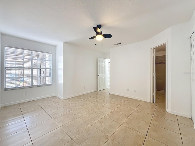 645 Stafford Ter Unit 163, Altamonte Springs, FL 32714 - empty room with light tile patterned flooring and a ceiling fan