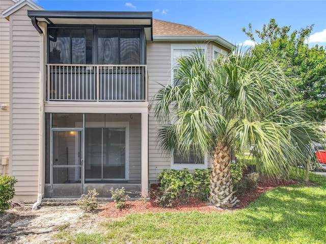 645 Stafford Ter Unit 163, Altamonte Springs, FL 32714 - rear view of house with a sunroom