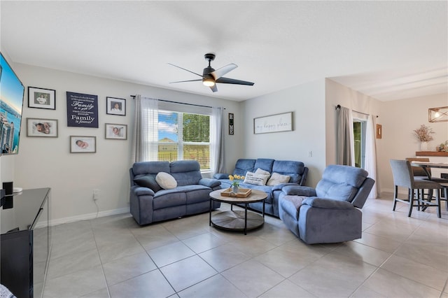 633 Greymount St, Davenport, FL 33837 - living area featuring a ceiling fan and light tile patterned flooring