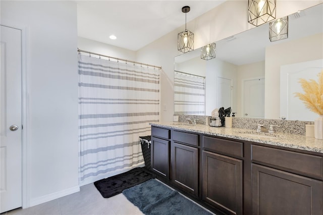 633 Greymount St, Davenport, FL 33837 - bathroom featuring double vanity, tile patterned flooring, and a shower with curtain