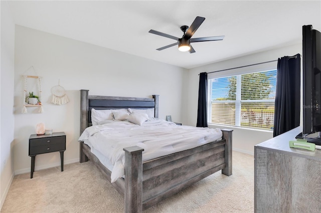 633 Greymount St, Davenport, FL 33837 - bedroom with light carpet and ceiling fan