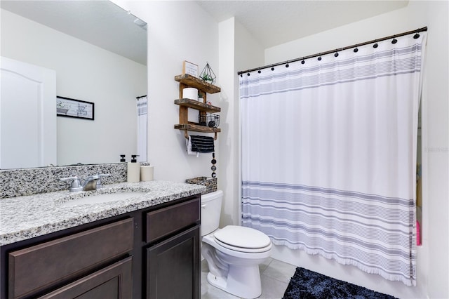 633 Greymount St, Davenport, FL 33837 - full bath with vanity, tile patterned floors, and shower / bath combination with curtain