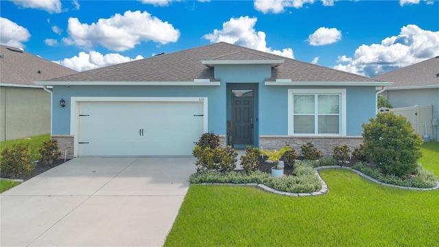 633 Greymount St, Davenport, FL 33837 - ranch-style home featuring stucco siding, stone siding, concrete driveway, a garage, and a shingled roof