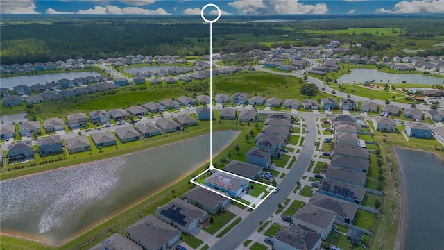 633 Greymount St, Davenport, FL 33837 - aerial perspective of suburban area featuring a nearby body of water and a heavily wooded area