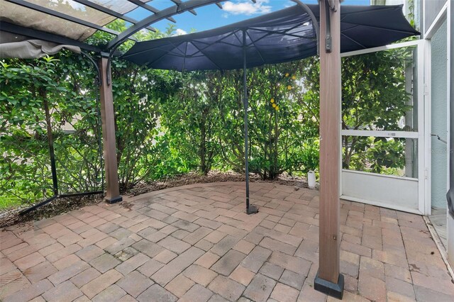 6027 Strada Isle Way, Orlando, FL 32835 - view of patio / terrace with a pergola