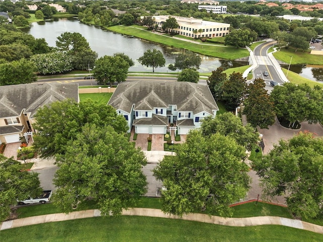6027 Strada Isle Way, Orlando, FL 32835 - bird's eye view of a nearby body of water and a tree filled landscape