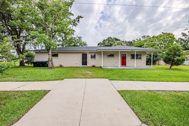4559 W Gore Ave, Orlando, FL 32811 - single story home featuring a front yard