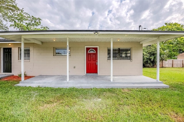 4559 W Gore Ave, Orlando, FL 32811 - view of front of house featuring concrete block siding