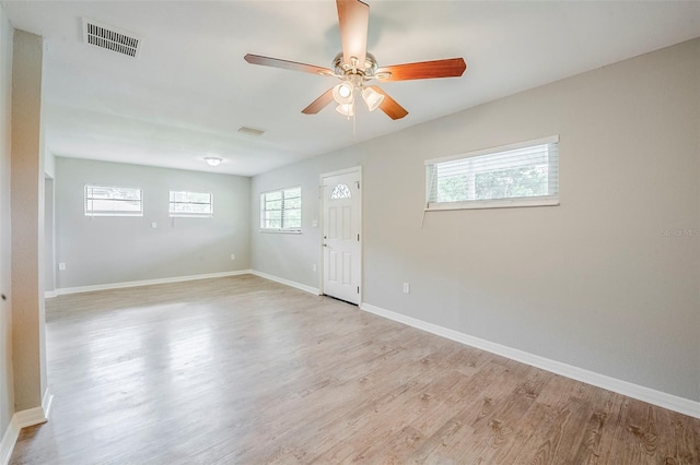 4559 W Gore Ave, Orlando, FL 32811 - unfurnished room with light wood-style floors and ceiling fan