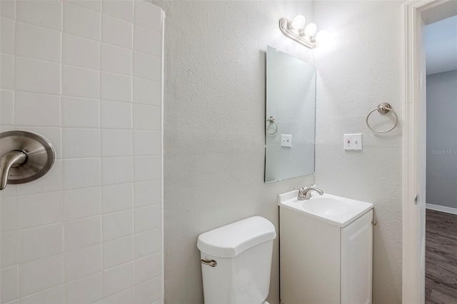4559 W Gore Ave, Orlando, FL 32811 - bathroom featuring vanity and toilet