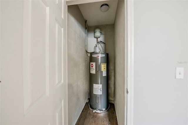 4559 W Gore Ave, Orlando, FL 32811 - utility room with electric water heater