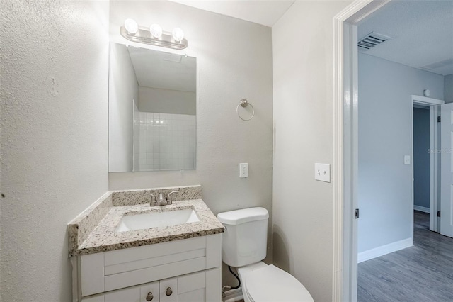 4559 W Gore Ave, Orlando, FL 32811 - bathroom featuring vanity and wood finished floors